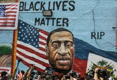  A mural painted by artist Kenny Altidor depicting George Floyd is unveiled on a sidewall of CTown Supermarket on July 13, 2020 in the Brooklyn borough New York City.