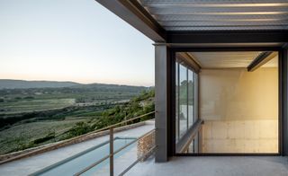 Rear terraces and balconies frame picturesque views out over the Catalonian countryside