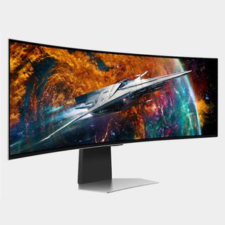 Samsung Odyssey OLED G9 gaming monitor with grey backdrop