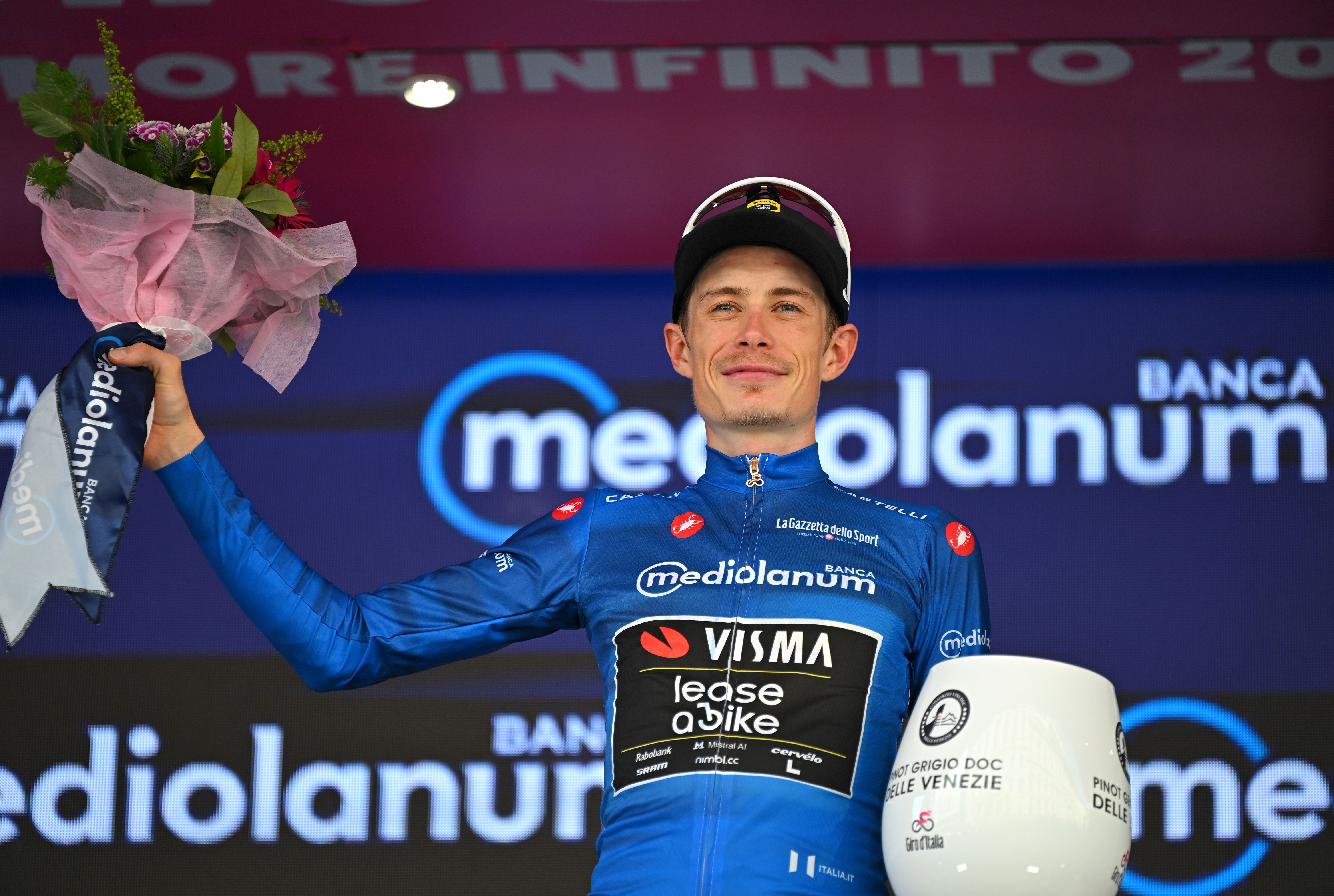 MILAN, ITALY - MAY 24: Jonas Vingegaard of Denmark and Team Visma | Lease a Bike celebrates at finish line as Blue Mountain Jersey winner during the 109th Giro d'Italia 2026, Stage 15 a 157km stage from Voghera to Milan / #UCIWT / on May 24, 2026 in Milan, Italy. (Photo by Tim de Waele/Getty Images)