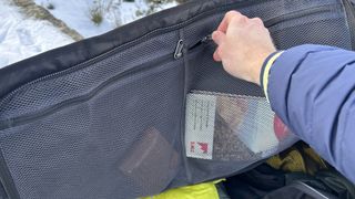 Zippered lid compartments in the Black Hole Duffel