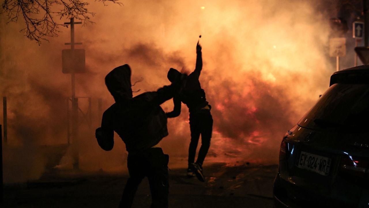 Protesters throws projectiles during clashes with police in Corsica