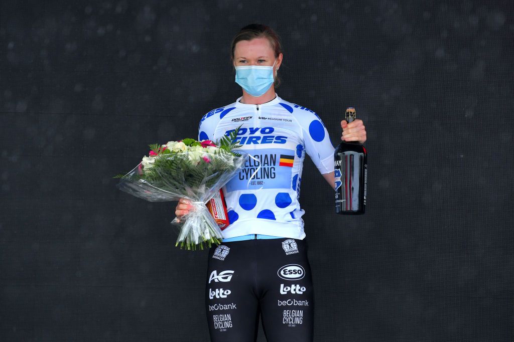 CHIMAY BELGIUM JUNE 22 Jolien Dhoore of Belgium and Belgium National Team Polka Dot Mountain Jersey celebrates at podium during the 9th Lotto Belgium Tour 2021 Prologue a 44km Individual Time Trial stage from Chimay to Chimay Beer Trophy ITT LottoBelgTour LottoBelgiumTour on June 22 2021 in Chimay Belgium Photo by Luc ClaessenGetty Images