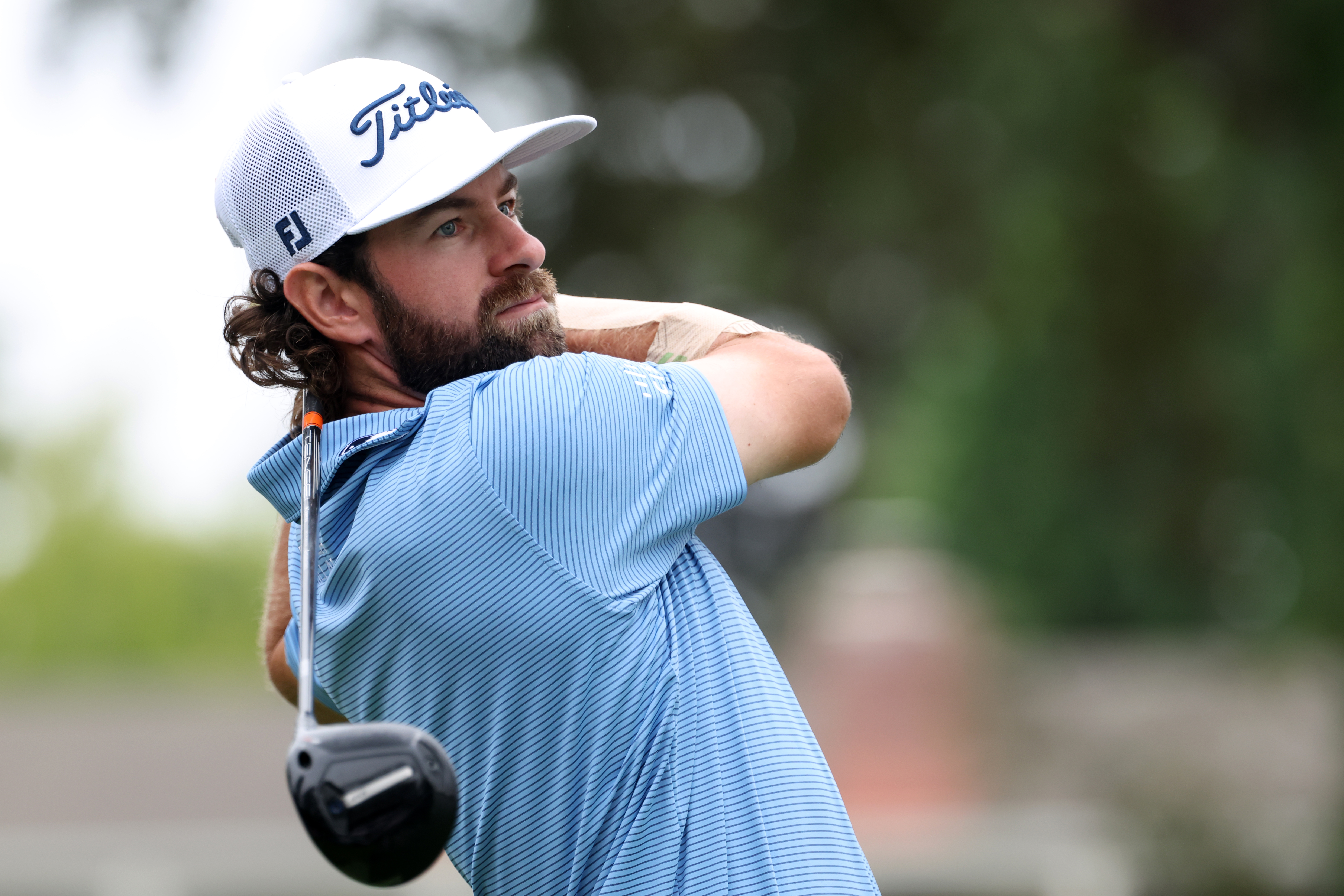 Cameron Young hits a mini driver off the tee