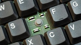 Old membrane keyboard rubber dome switches object macro extreme closeup shot
