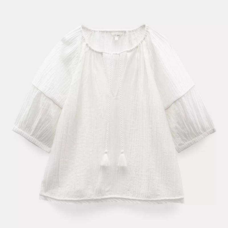 A short sleeved white blouse with tassels by Hush