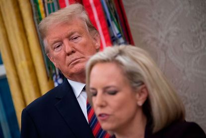 Trump and Kirstjen Nielsen before the panic