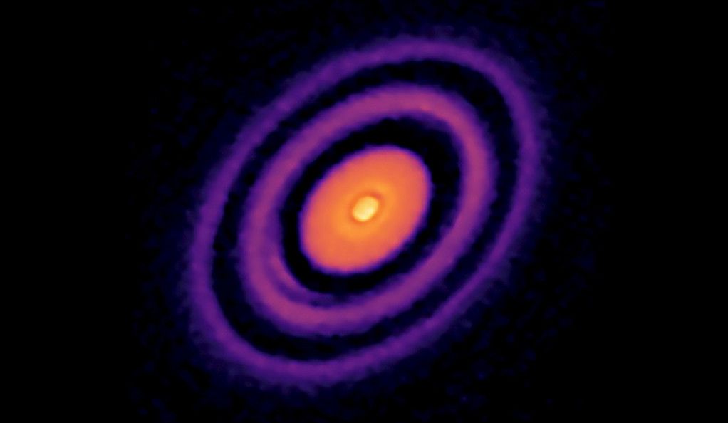 An image of a protoplanetary disk and black gaps marking where planets are formed, as captured by the Atacama Large Millimeter/submillimeter Array telescope in Chile.