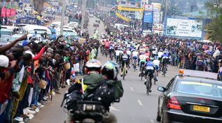 Huge crowds line the street at the riders set off on stage 2