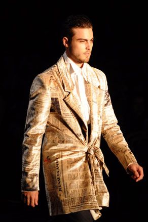 Velvet newspaper prints and extravagant tailoring at Amapô