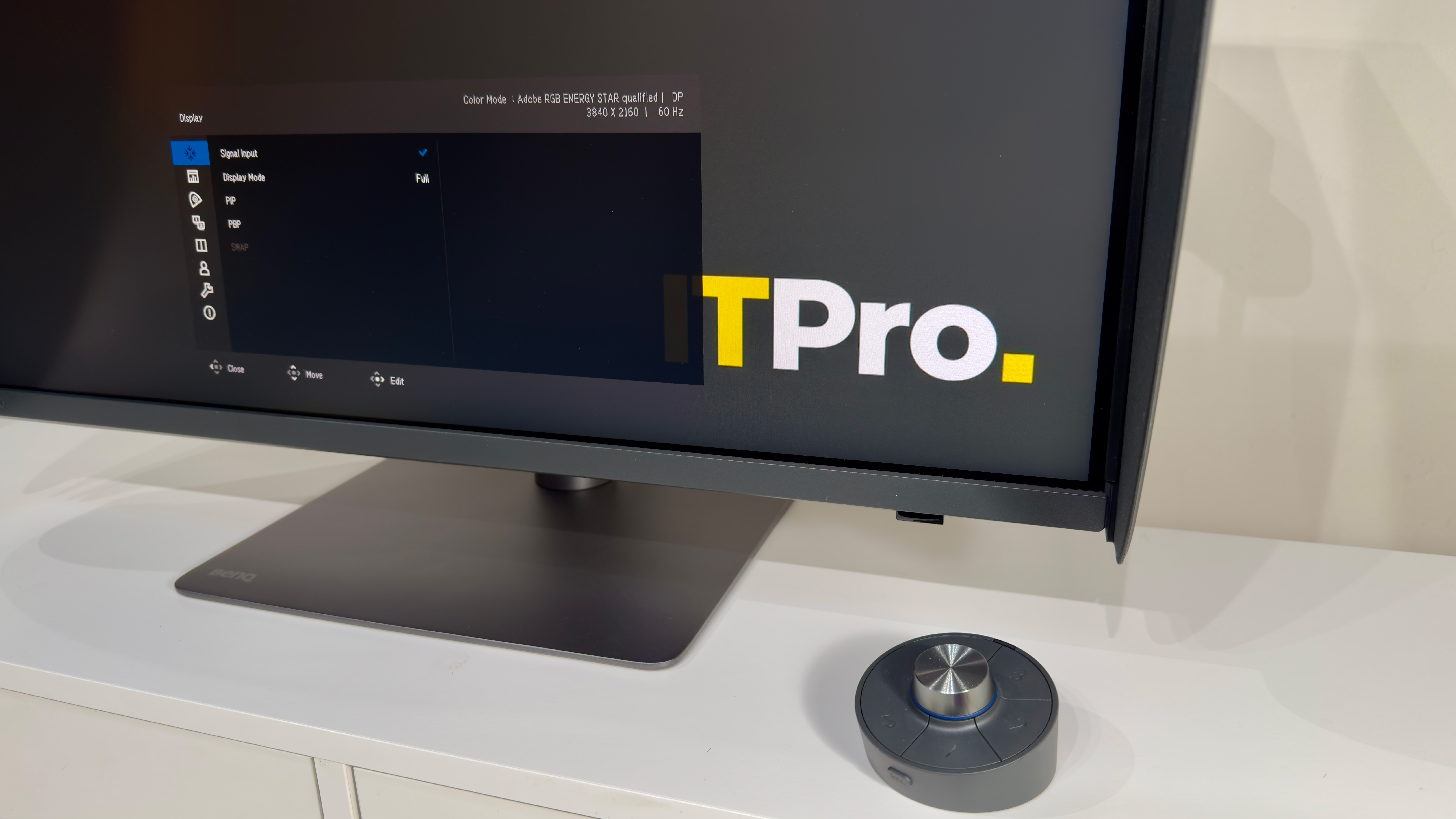 The BenQ PD2770U monitor on a desk