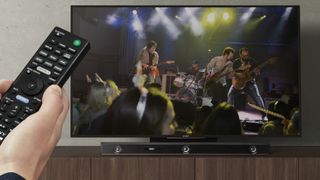 Showing the Sony HT-Z9F soundbar in use when viewing a rock concert