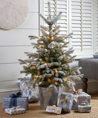 Christmas tree in a silver metal pot