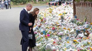 Prince William, Prince of Wales and Catherine, Princess of Wales view floral tributes at Sandringham