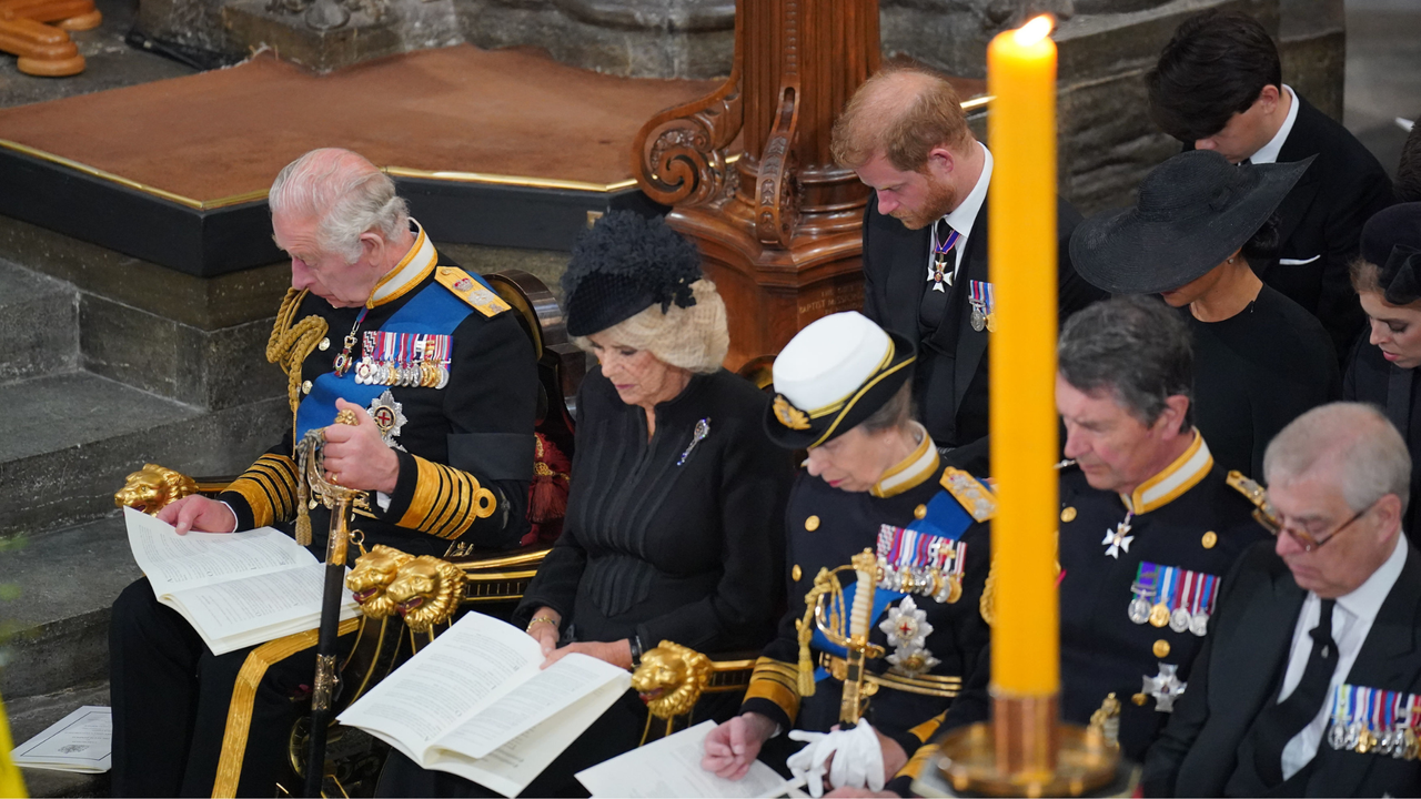 King Charles III, Camilla, Queen Consort, Princess Anne, Princess Royal, Prince Harry, Duke of Sussex and Meghan, Duchess of Sussex, during the State Funeral of Queen Elizabeth II