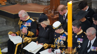 King Charles III, Camilla, Queen Consort, Princess Anne, Princess Royal, Prince Harry, Duke of Sussex and Meghan, Duchess of Sussex, during the State Funeral of Queen Elizabeth II