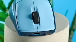 A Glacier Blue Corsair M75 wireless gaming mouse for Mac