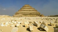 The Step Pyramid with a blue sky in the background.