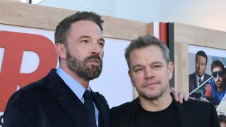 Matt Damon and Ben Affleck posing together at the premiere of Air