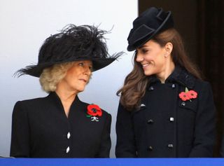 Kate Middleton and Camilla smile during the Remembrance Day Ceremony at the Cenotaph on November 13, 2011 in London