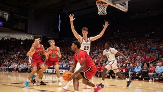 Saint Francis Red Flash's Ace Talbert in action against the Dayton Flyers