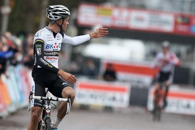 Scheldecross winner Niels Albert looks back to herald second place finisher Mathieu van der Poel at Scheldecross