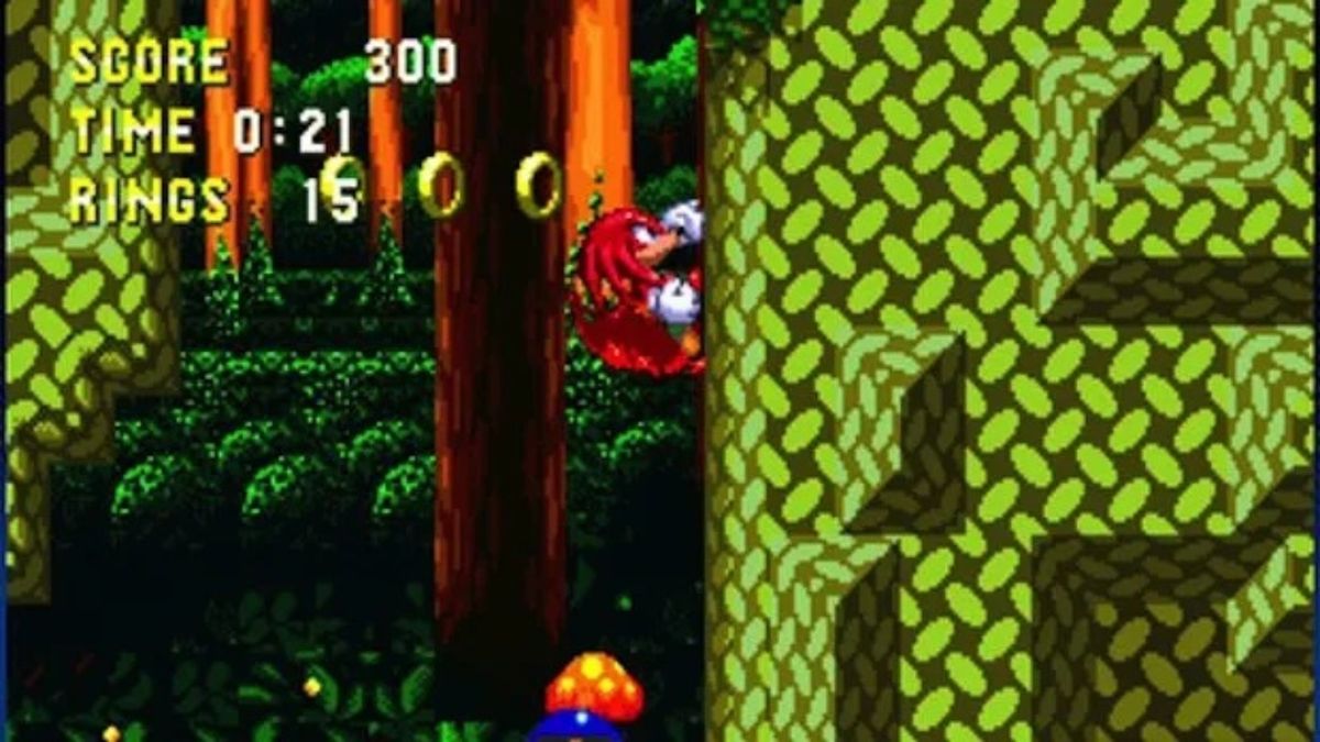 Sonic 3 and Knuckles on the Sega Genesis showing Knuckles climbing up a forest platform