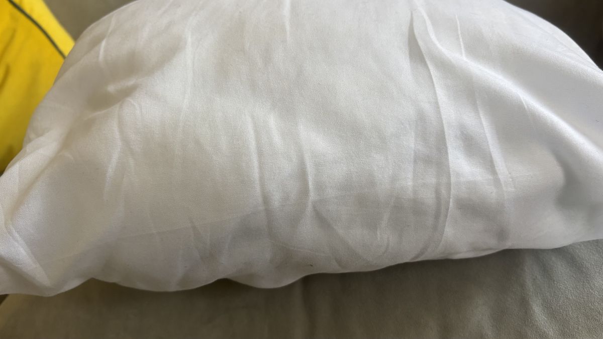 A white pillow after being cleaned with hydrogen peroxide.
