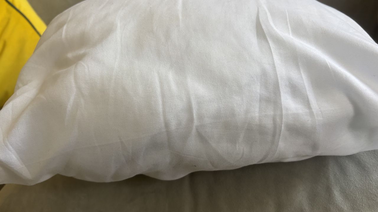 A white pillow after being cleaned with hydrogen peroxide.