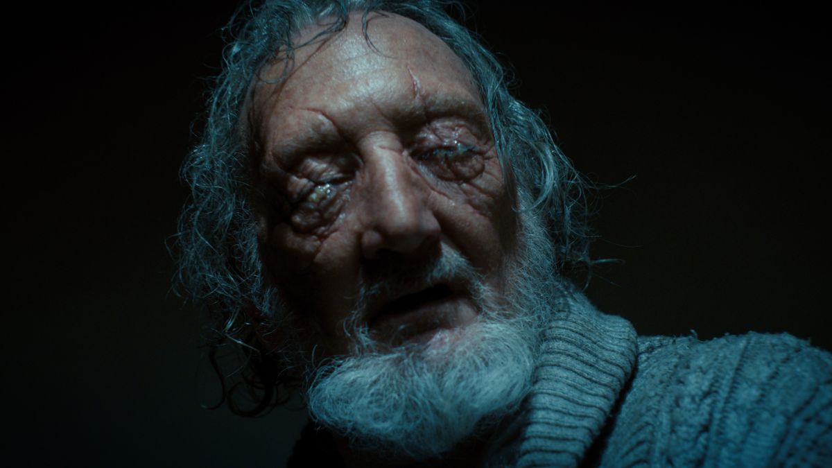 old man who's eyes are covered in Stranger Things