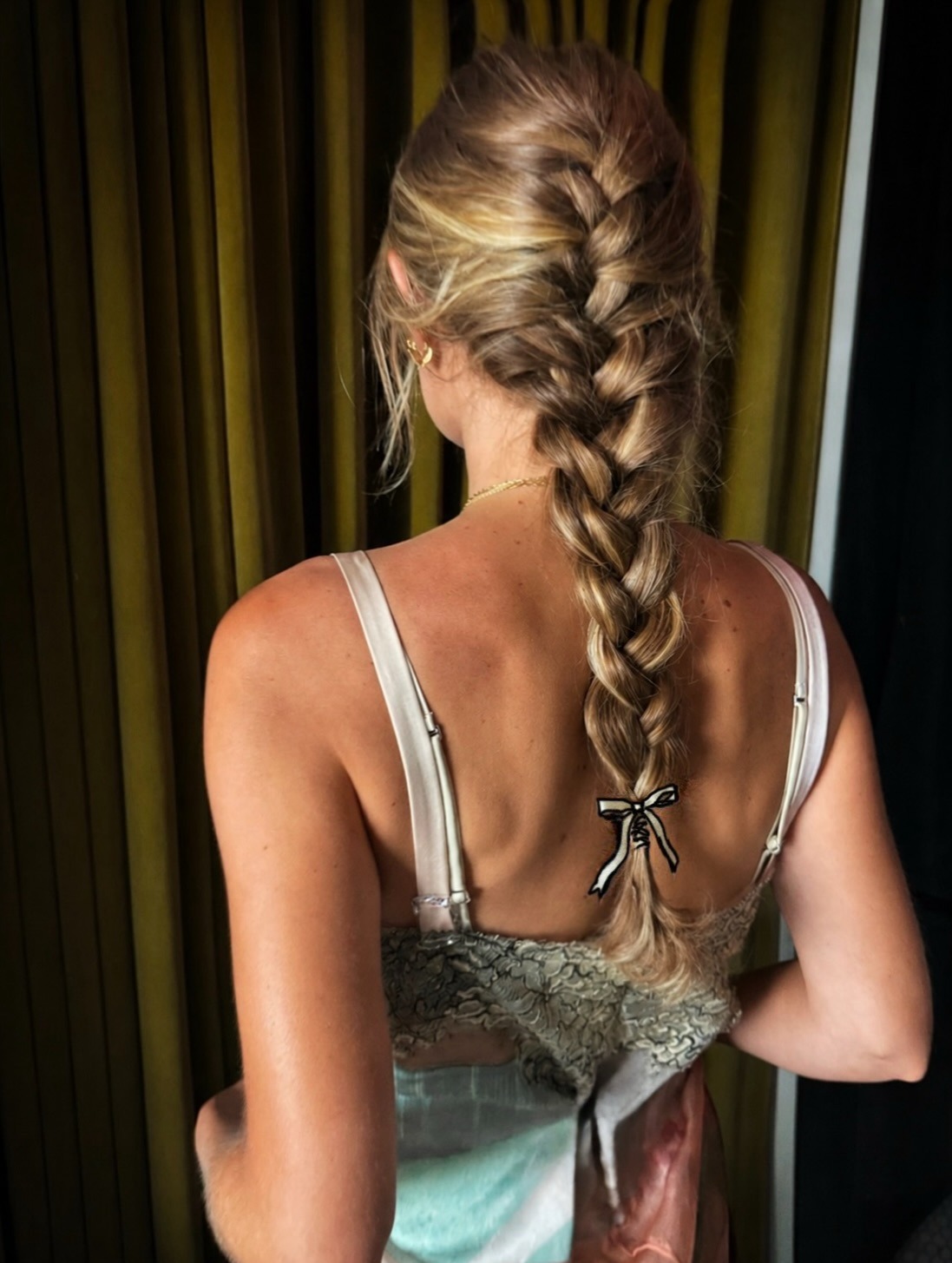 Gigi Hadid wearing a French braid hairstyle