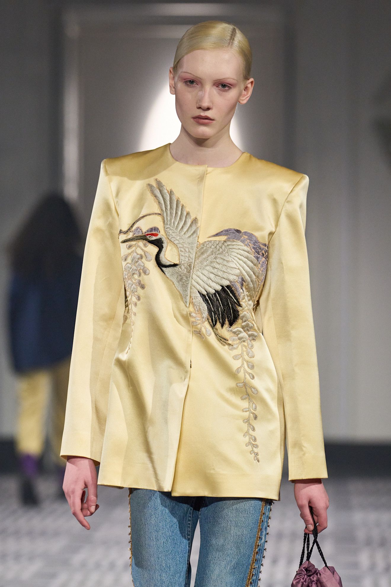 Conner Ives model wearing an embroidered jacket, a big fall 2026 micro-trend.