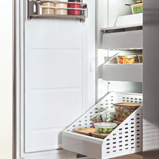 Freezer with pull out drawer and shelves of organised food