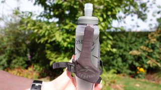 Osprey Duro Dyna Handheld water bottle in person's hand