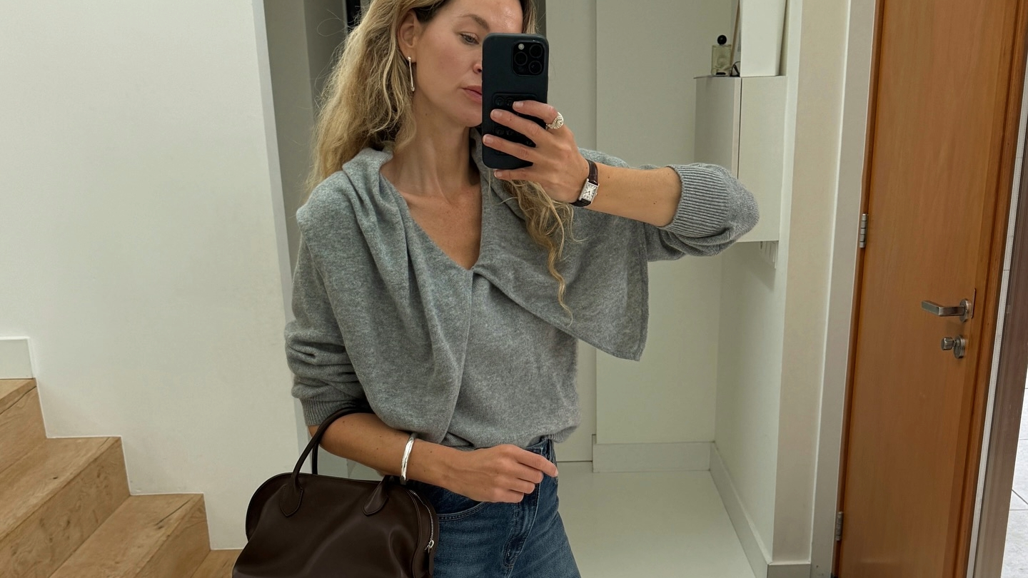 Anouk Yve in a grey Tove sweater