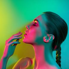  colour correcting palettes - Model with colourful lights lighting her up - gettyimages926617828 -