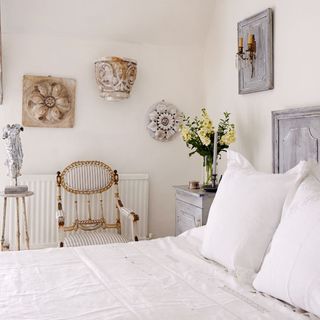 farmhouse exterior main bedroom with soft grey painted bedroom bed and bedside cabinet