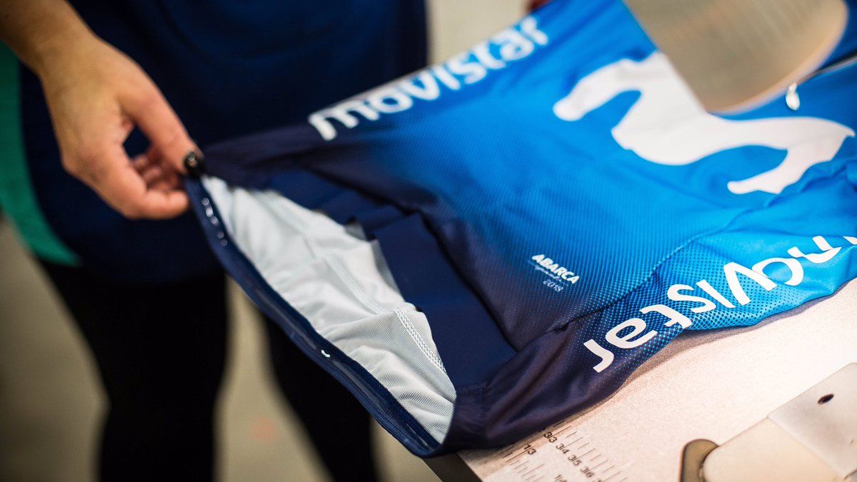 The bottom of the jersey fades into the black shorts