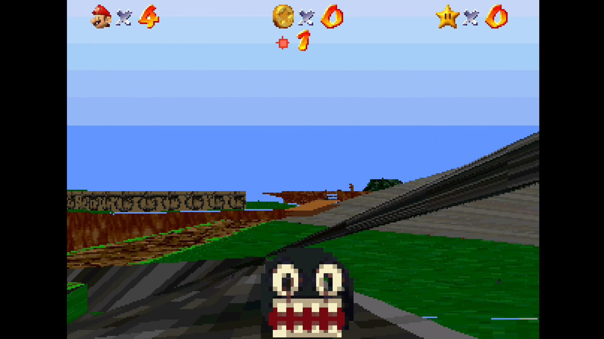 Screenshot of Mario 64 running on 3DO with chain chop sprite in centre.