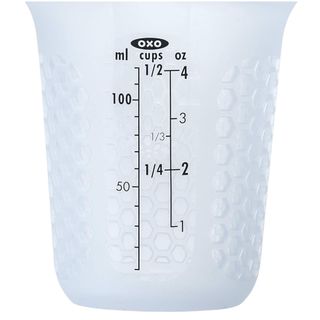 A plastic silicone measuring cup