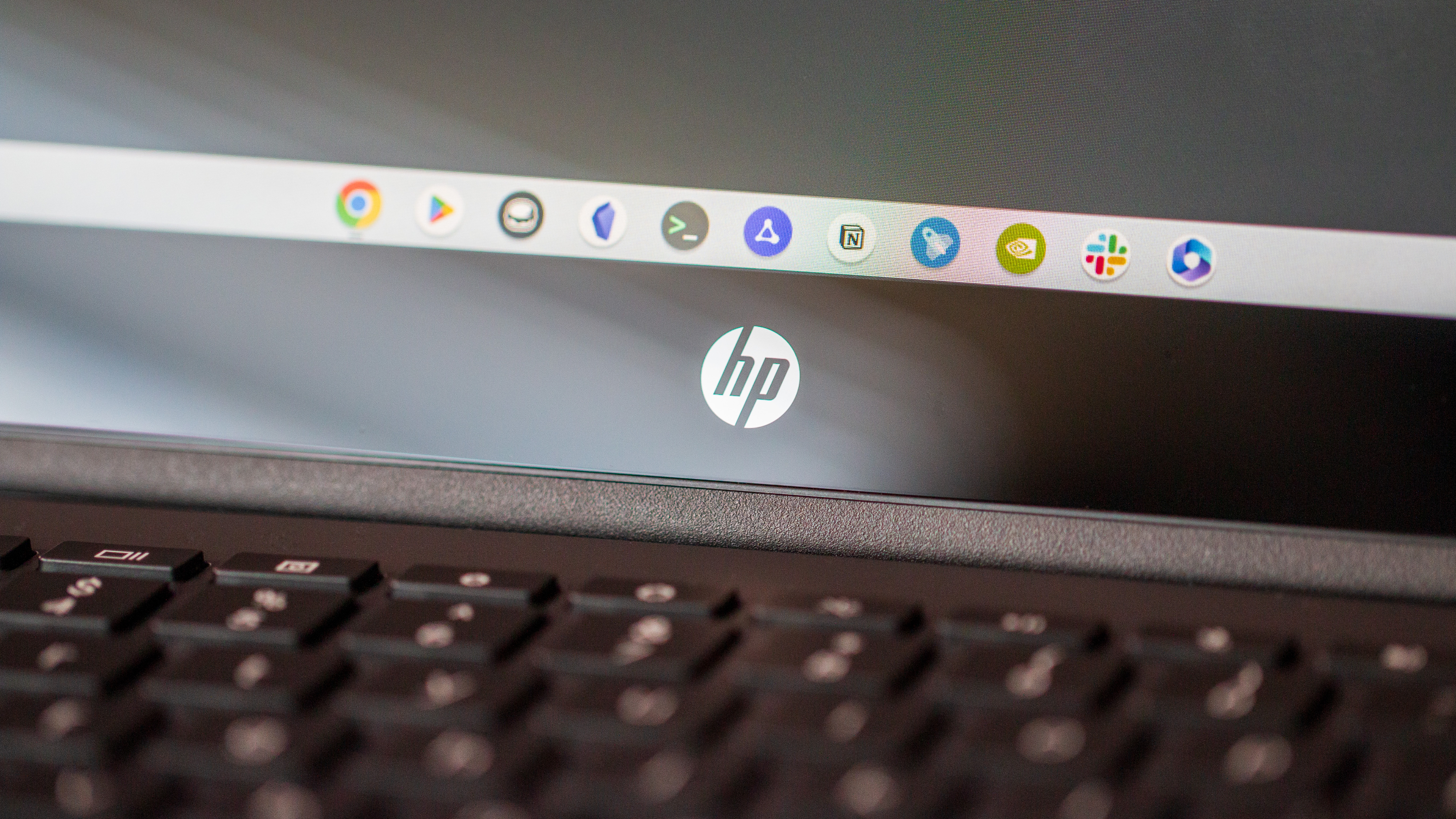 HP Chromebook x360 13b close-up on HP logo