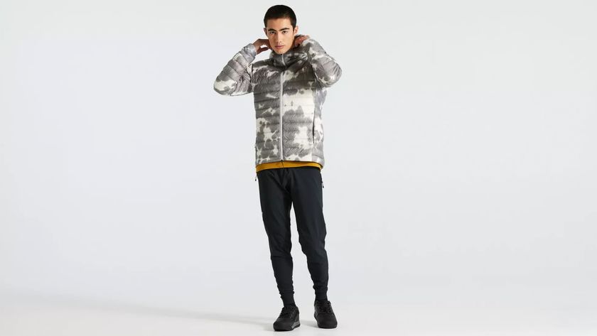 Male wearing the Specialized Packable Down Jacket