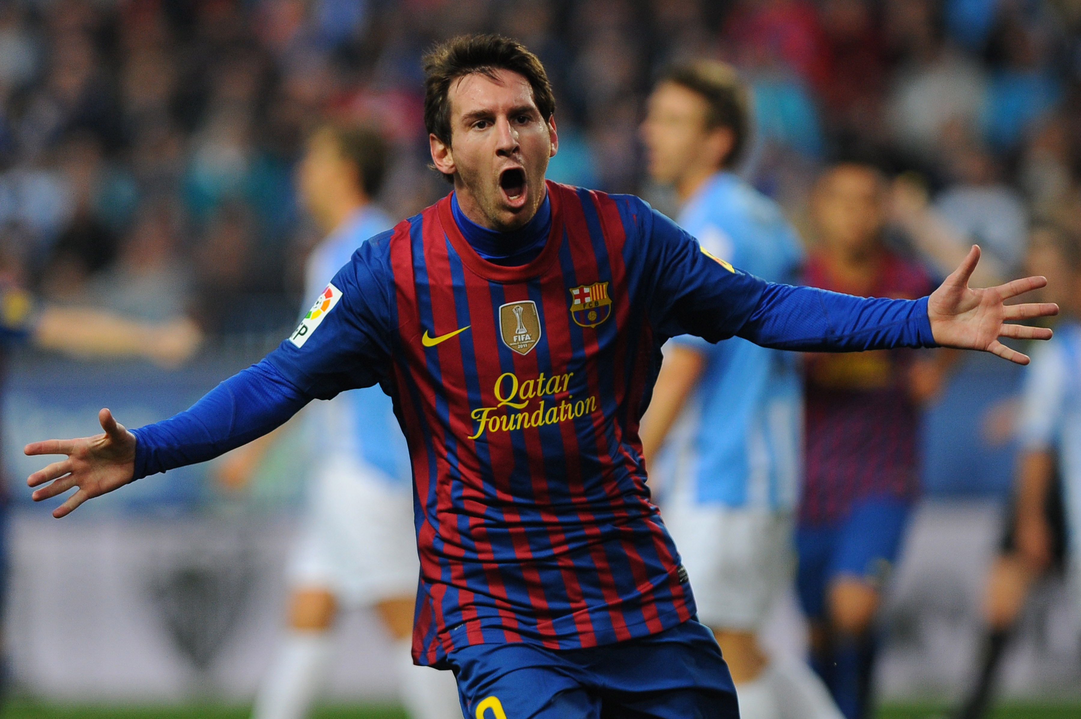 Lionel Messi celebrates a goal for Barcelona against Malaga in January 2012.