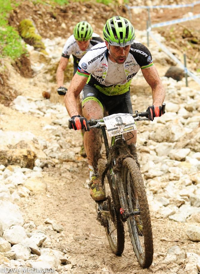Jose Antonio Hermida (Multivan Merida) descending with a teammate through a rock garden