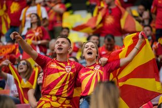 North Macedonia supporters cheer prior the Euro 2020 soccer championship group C match between Ukraine and North Macedonia at the National Arena stadium in Bucharest, Romania, Thursday, June 17, 2021. (AP Photo/Vadim Ghirda, Pool)