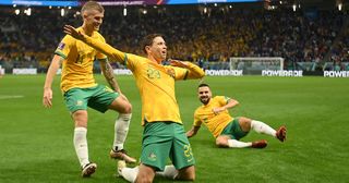 Craig Goodwin (C) celebrates with teammates after he scored the opening goal during the Qatar 2022 World Cup Group D football match between France and Australia at the Al-Janoub Stadium in Al-Wakrah, south of Doha on November 22, 2022.