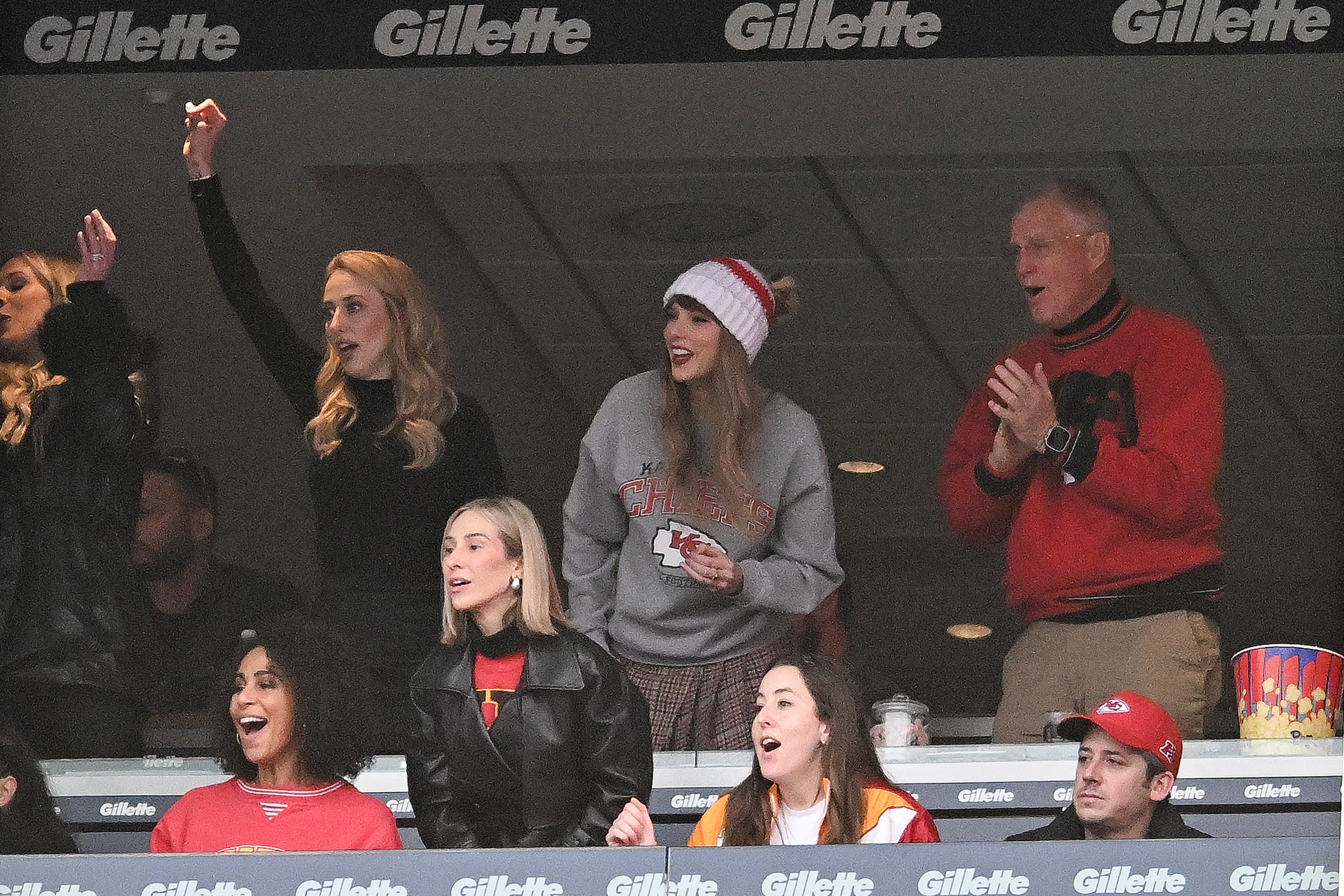 Taylor Swift at a Chiefs game wearing a Rails mini skirt