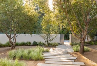 Landscape project with concrete pavers by Assembledge+