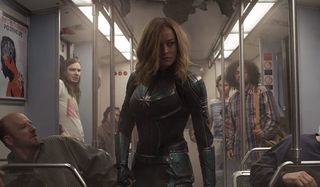 Brie Larson as Captain Marvel on bus in 2019 movie