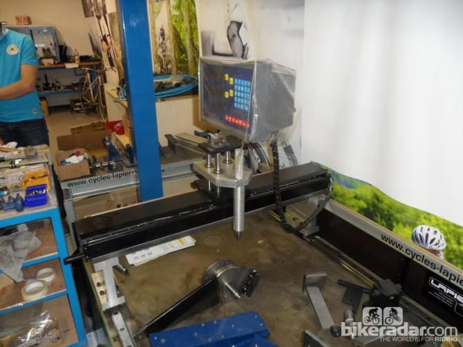 This table is used to test the integrity of pivots on Lapierre's full-suspension bikes